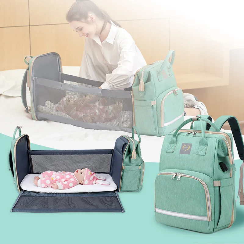 Wielofunkcyjny 3 w 1 Baby Diaper Torba z Stacja chaningowa Moms I Dads Plecak USB Maternity Travel Turt Lot Wodoodporna Wózek pielęgniarski Handbag Folding Bed 2022 Nowy