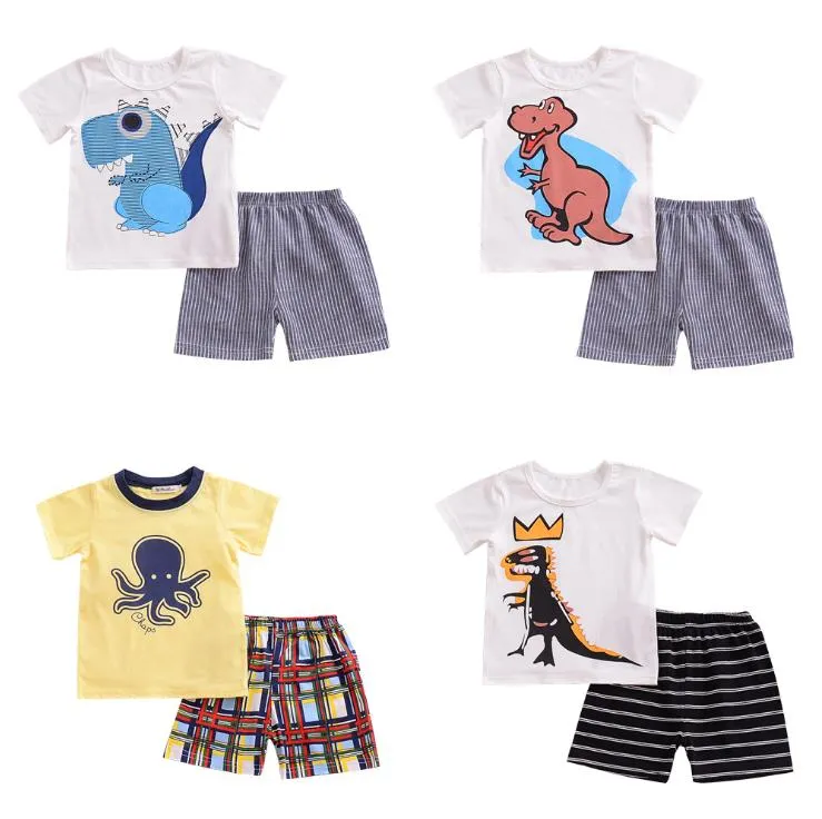 INS Set di vestiti per bambini T-shirt da dinosauro per ragazzo del bambino Pantaloncini a righe 2 pezzi Set manica corta per bambina Abiti estivi Abbigliamento per bambini DW5280