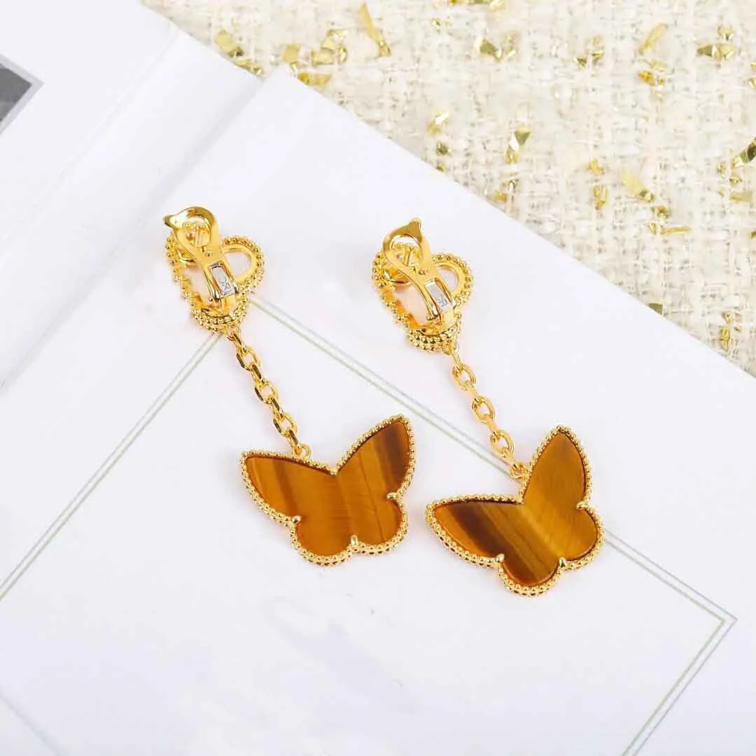 S925 silver Top quality one flower and butterfly shape clip earring with white shell and tiger stone for women wedding jewelry gif254Q