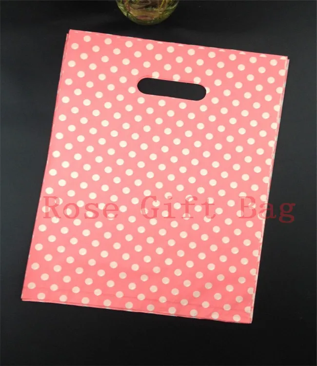 En gros 50 pcs/sac blanc rond points rose sacs en plastique 25x35 cm Shopping bijoux emballage sacs en plastique cadeau sac avec poignée