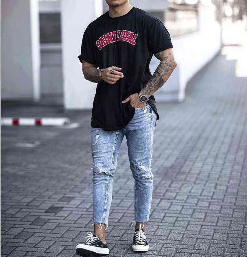 Mens jeans ripped at hot sale bottom