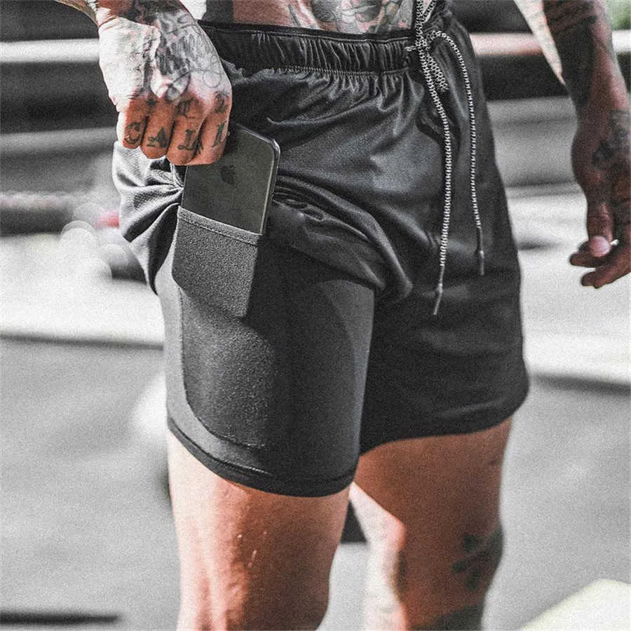 Double layer Jogger Shorts Men 2 in 1 Short Pants Gyms Fitness Built-in pocket Bermuda Quick Dry Beach Shorts Male Sweatpants 210720