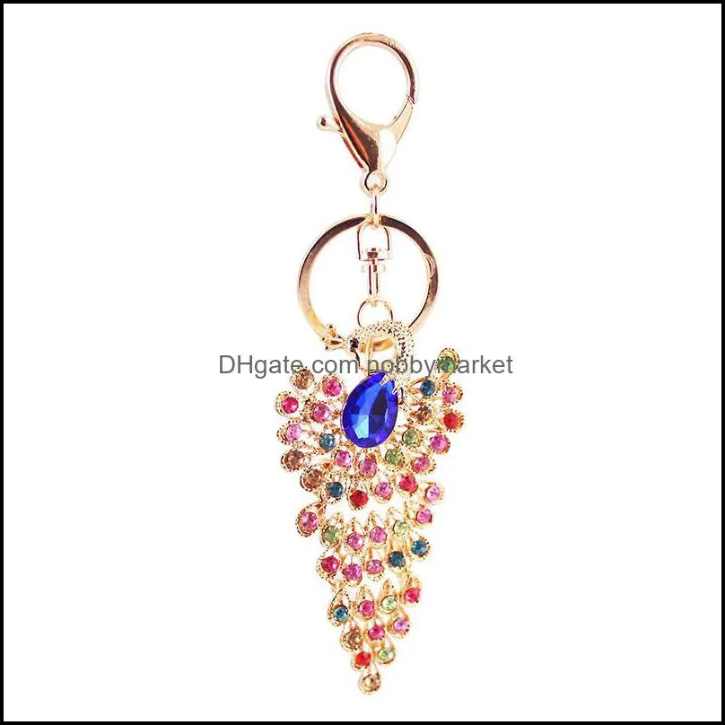 Porte-clés Bijoux Est Mode Porte-clés 3pcs Colorf Strass Cristal Pavé Animal Beauté Paon Chaîne Suspendue Femmes Voiture 473C3 Drop Deliver