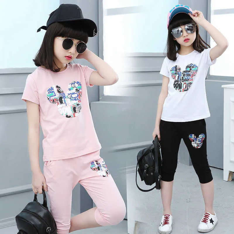 Completi Di Abbigliamento Ragazze Tuta Casual T Shirt Da Cartone Animato Ragazza Pantaloncini 2 Pezzi Set Di Vestiti Bambini 4 14 Anni Tute Sportive In Stile Scolastico X0802 Da 13 75 DHgate