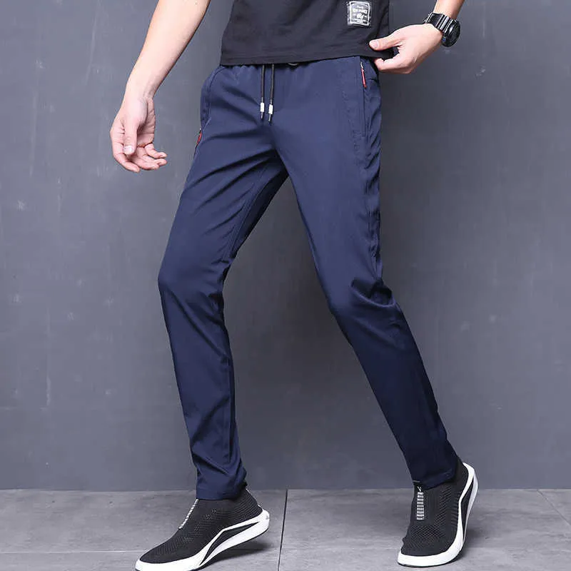 Calça de verão masculino magro esticado coreano casual calça fit fit chino chino cintura vestido corredor calças masculino preto azul x0615