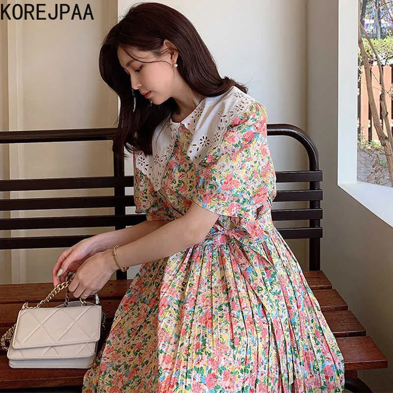 Korejpaa Kobiety Dress Summer Koreański Chic Redukcja wieku Sweet Hollow Doll Collar Lace-Up Floral Puff Sleeve Plised Vestidos 210526