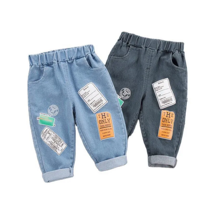 Letra dos desenhos animados Crianças Roupas Meninas Jeans Cintura Elástica Cintura Médio Crianças Meninos Calças Primavera Outono Calça De Bebê 1-4 Anos 210317