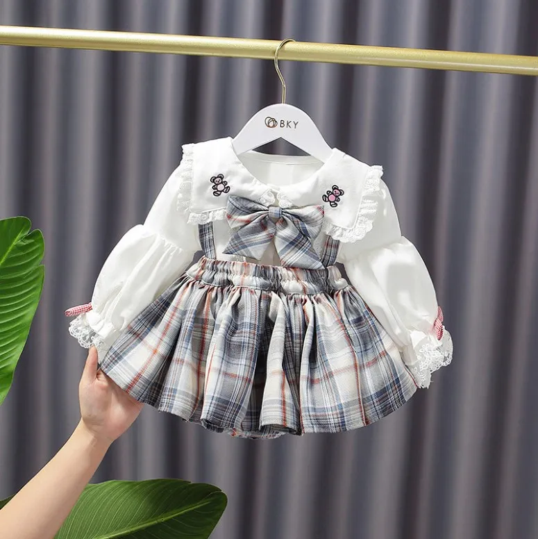 幼児のお姫様服セット秋の女の子ロリータ衣装秋のドレスカレッジかわいいキッズ漫画刺繍シャツ +格子縞のプリーツサスペンダースカート2pcsスーツS1603