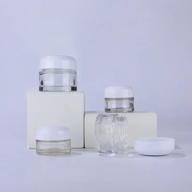Bottiglie all'ingrosso 15g 20g 30g 50g Vaso di crema per la cura personale in vetro trasparente per trucco cosmetico ricaricabile con tappo bianco