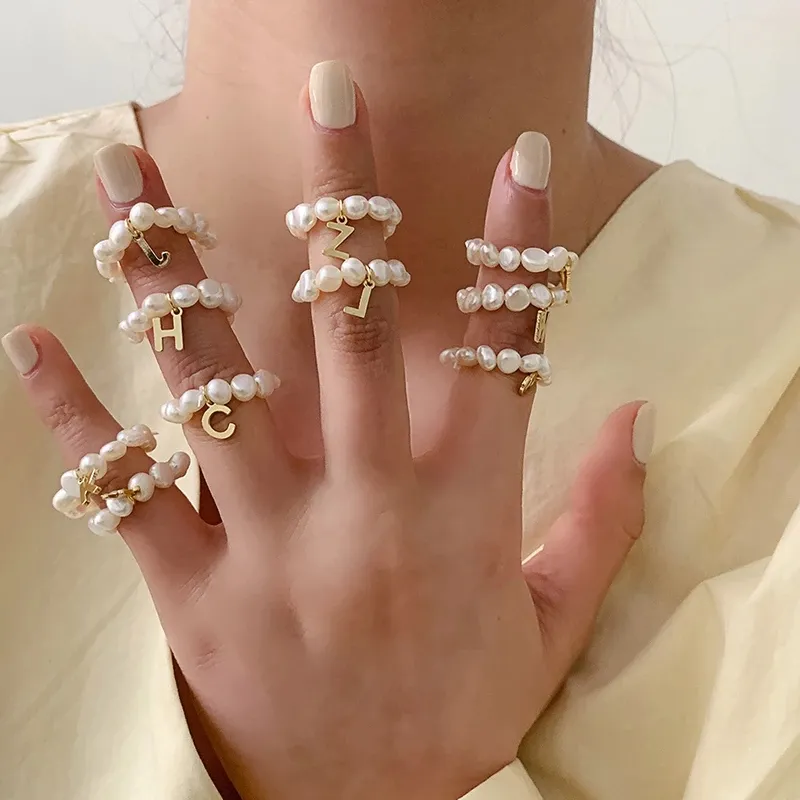 Korean Fashion Elastic Rope Pearl Beads Ring Elegant Simple Female Alphabet Pearl Ring Charming Women Party Jewelry Girl Gift