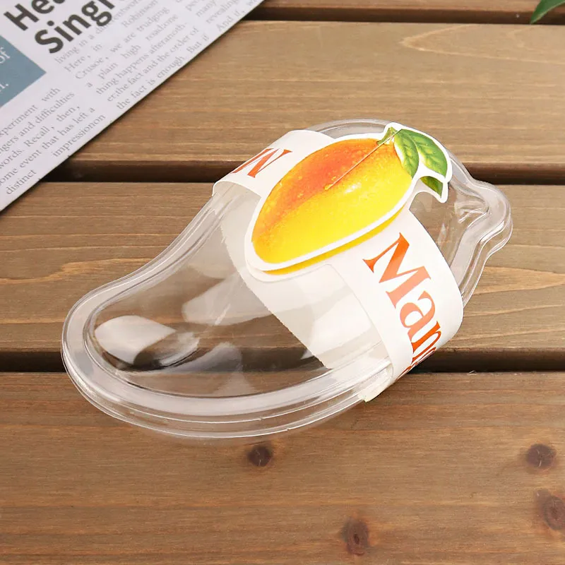 蓋のチーズアイスクリームのムースの容器が付いているマンゴーの形のフルーツケーキの包装箱の透明な透明なプラスチック箱