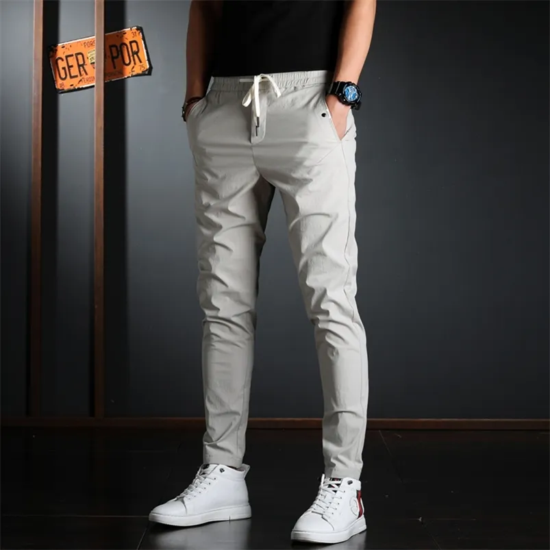 Zomer mannen elastische taille casual broek koreaanse straatkleding lichtgewicht katoen grijs slim fit broek 210715