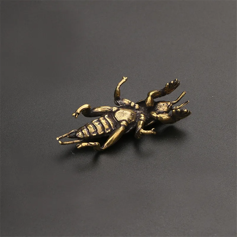 brass Mole cricket figurines (6)
