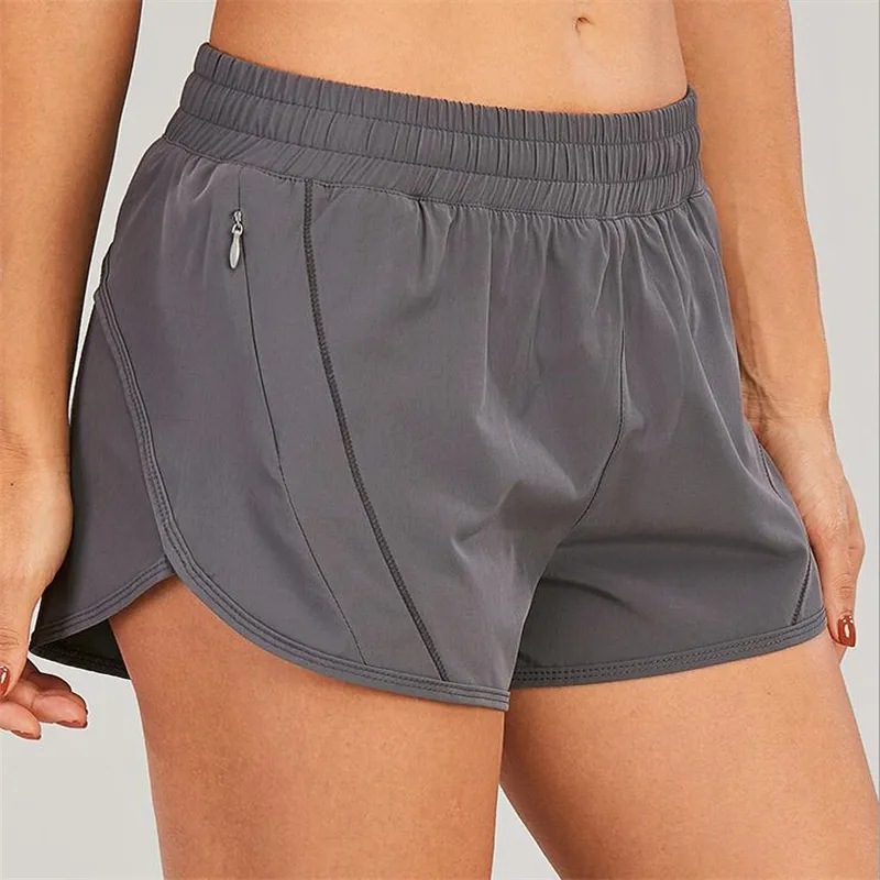 lu Pantaloncini da yoga per danza da donna Pista foderata con tasca con cerniera Pantaloncini con cuciture in filato di maglia in tessuto morbido burro ll0160