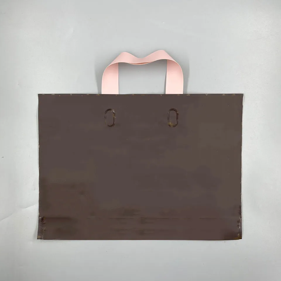 مصممي العلامات التجارية نساء أحاديات حقائبة مصنوعة من الأكياس البلاستيكية حقيبة بلاستيكية أصلية جودة عالية للملابس حقائب التسوق مربع هدايا الأزياء P233H