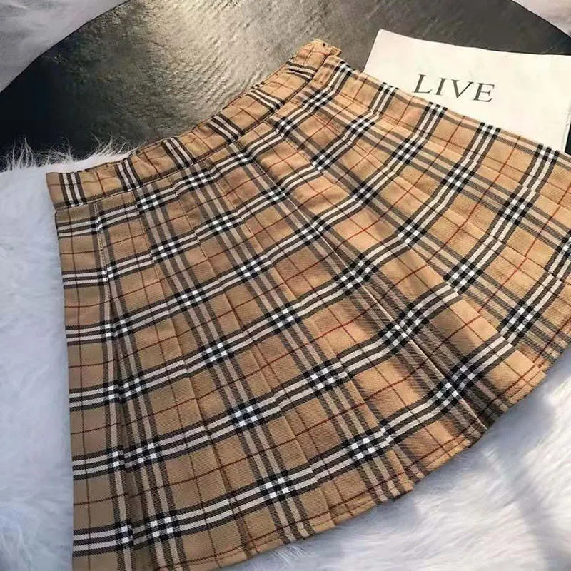 Women's skirts 2021 spring and autumn high waist cute sweet girl plaid anti-empty skirt