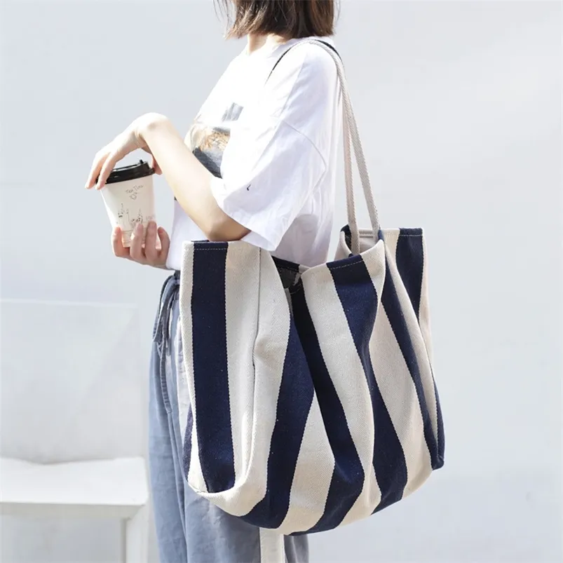 Navy and top white striped handbag
