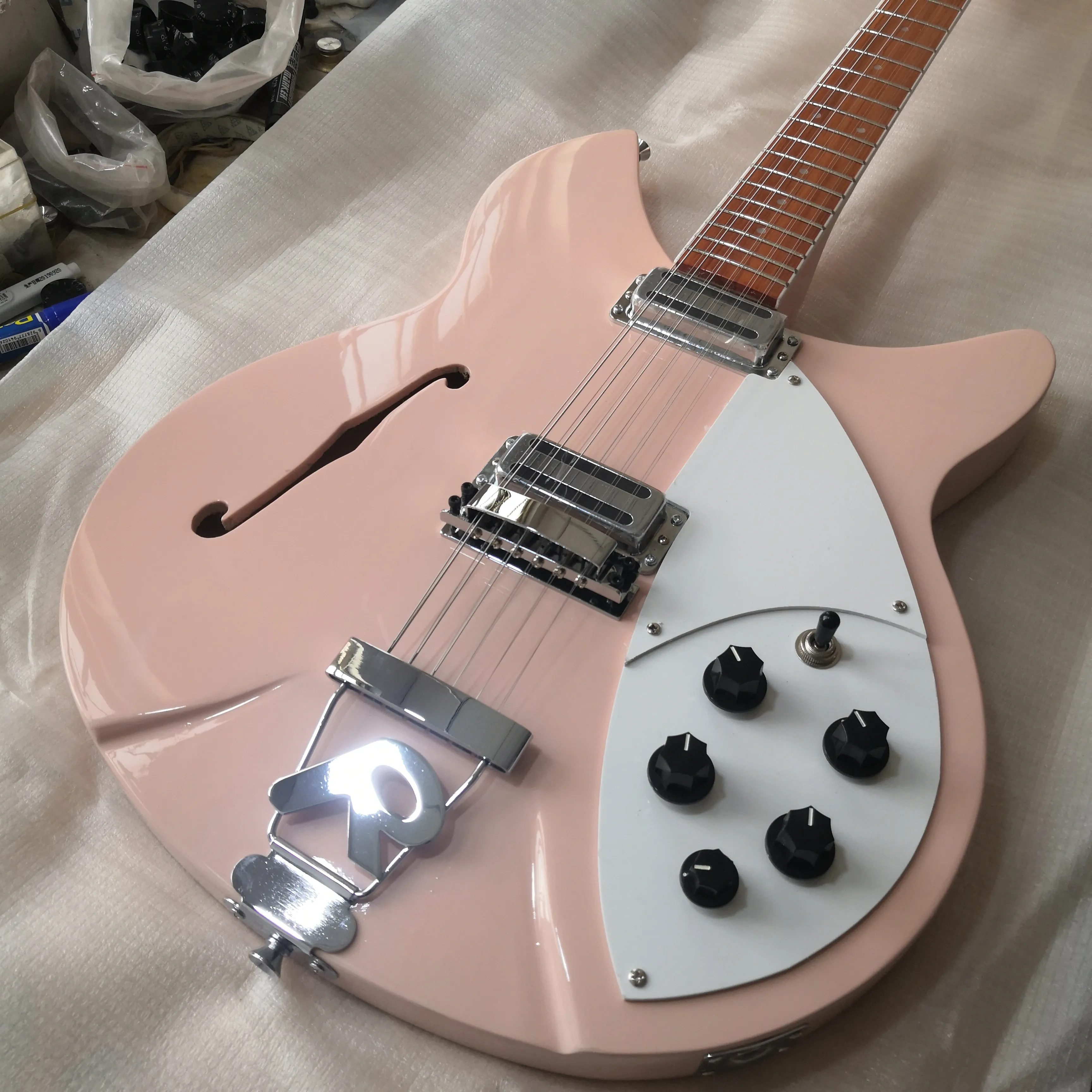 Pink semi hollow guitar hotsell