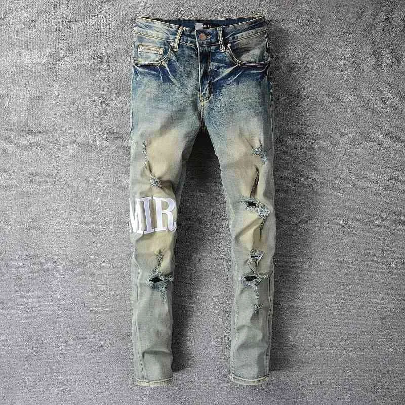Jeans con lettera ricamata toppa europea americana slim cerniera per il tempo libero pantaloni lavati da uomo a tubo dritto