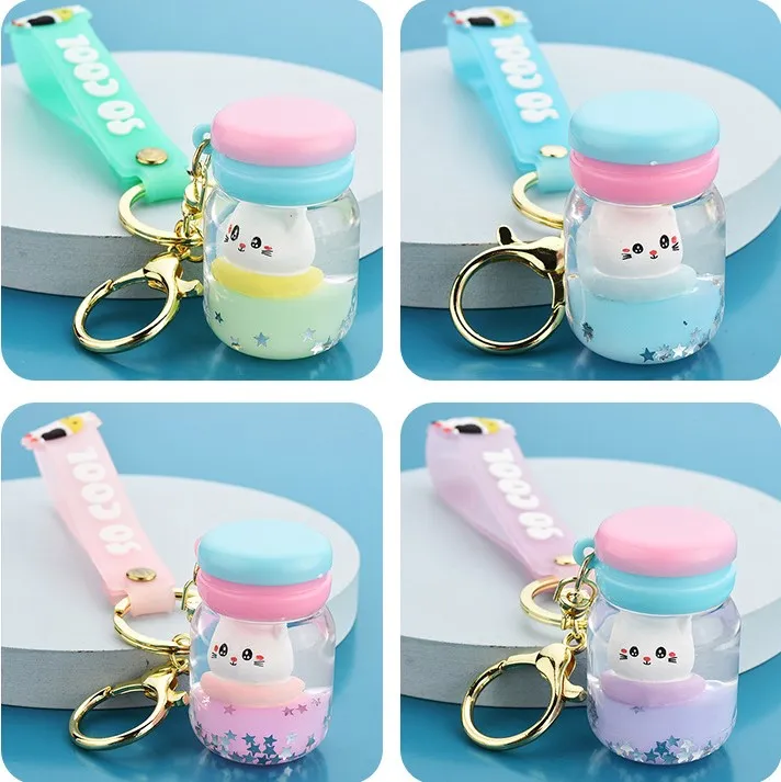 Macaron flutuante Macaron Quicksand Keychain Surfing Gato Frifting Garrafa Pingente Carro Bolsa Chaveiro Bag Anel para Menina E Mulheres Presente Acessórios Jóias