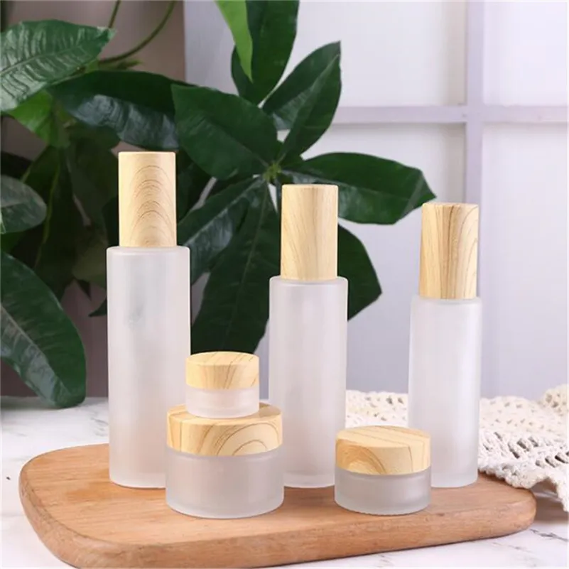 Bouteille en verre dépoli Pot de crème avec couvercle en bois imité Bouteilles de pompe de pulvérisation de lotion Pots cosmétiques rechargeables 20 ml 30 ml 60 ml 80 ml 100 ml