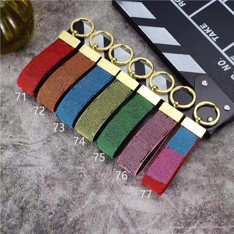 Créateur de mode luxe designers porte-clés étuis marque hommes boucle en or porte-clés voiture mignon porte-clés dames pendentif charme fait main en cuir femmes