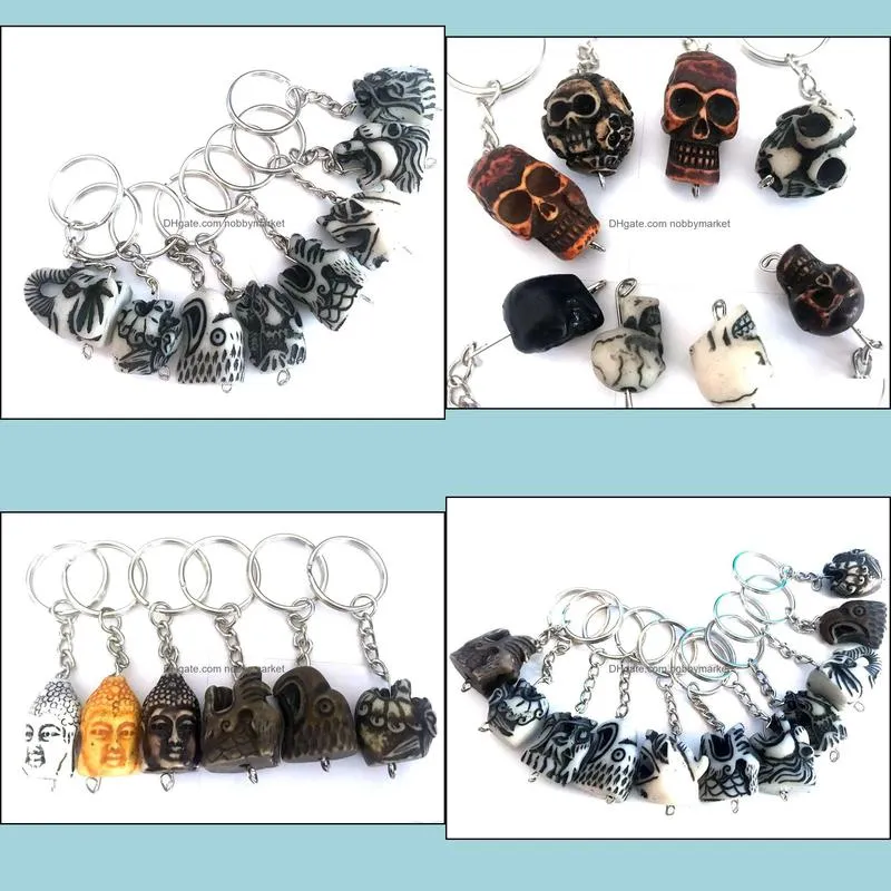 100 pcs biker keychain mixed totem cool men`s jewelry rock key ring