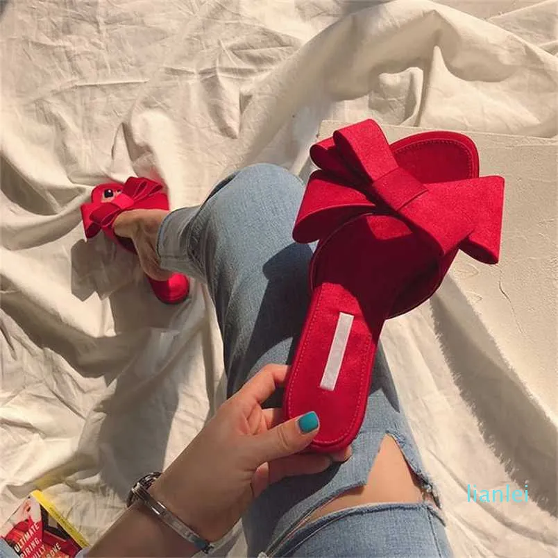 Wearing flat slippers women's shoes Korean version of the summer large bow satin round head sandals Wild half 211206