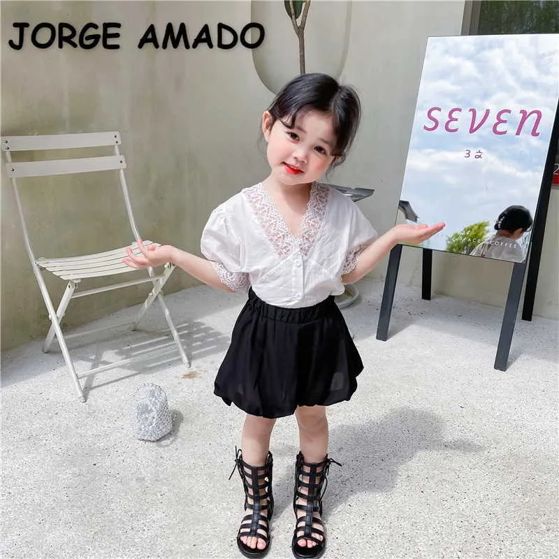 Корейский стиль летние дети девушки 2 шт. Устанавливает белые кружева V-образным вырезом рубашки + черные тыквенные шорты детская одежда E8032 210610