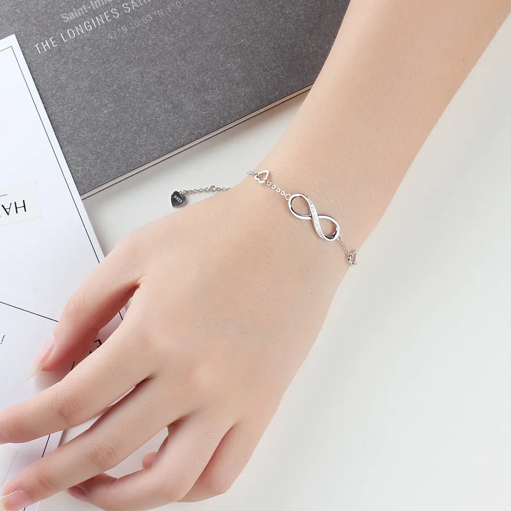 Sterling Silver Infinity Bracelet With Heart Shaped Cubic Sterling Silver Infinity Bracelet With Heart Shaped Cubic