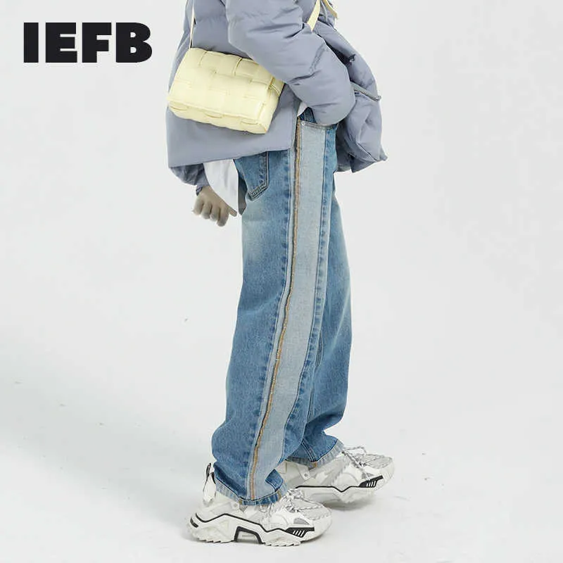 IEFB Mäns Slitage Färg Block Patchwork Blå Jeans Vår Koreanska Streetwear Design Tvättade Denim Straight Loose Trousers 210622