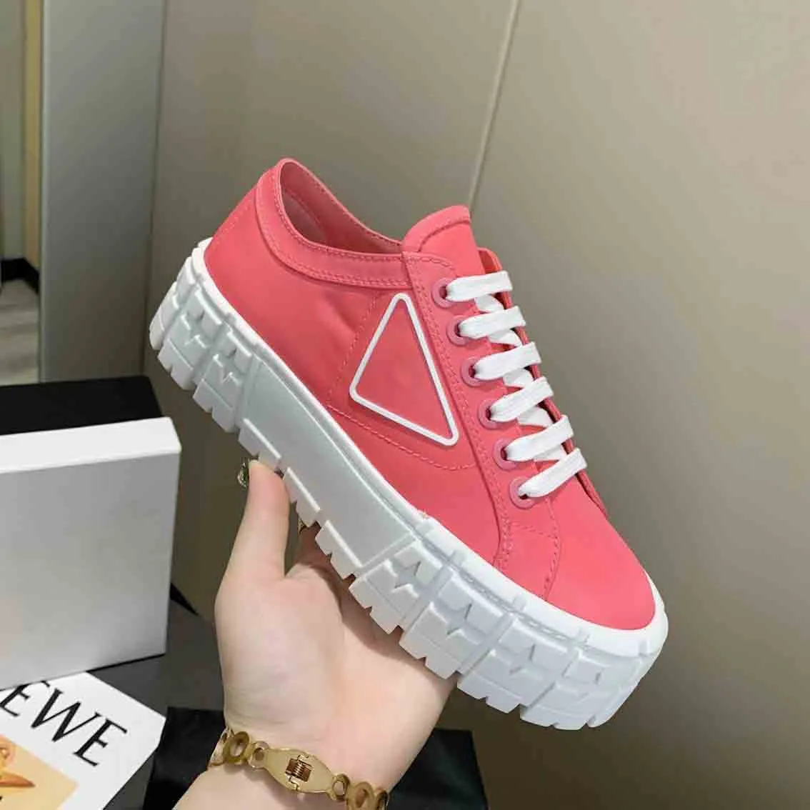 rubber platform women men casual shoes sneaker inspired by motocross tires defines the design of nylon gabardine sneakers this logo triangle decorate50 mm box