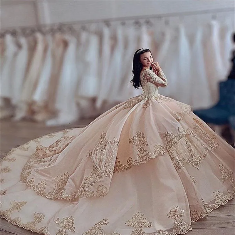 2021 Sexy Luxury Champagne Quinceanera Ball Gown Dresses Long Sleeves Jewel Neck Lace Appliques Crystal Beads Sweep Train Tiered Plus Size Party Prom Evening Gowns