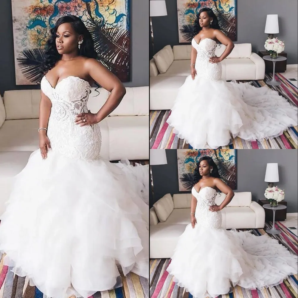 2022 Sexy African Sweetheart Sirena Vestidos de novia Ilusión Apliques de encaje Con cuentas de cristal Volantes Organza escalonada Vestidos de novia formales