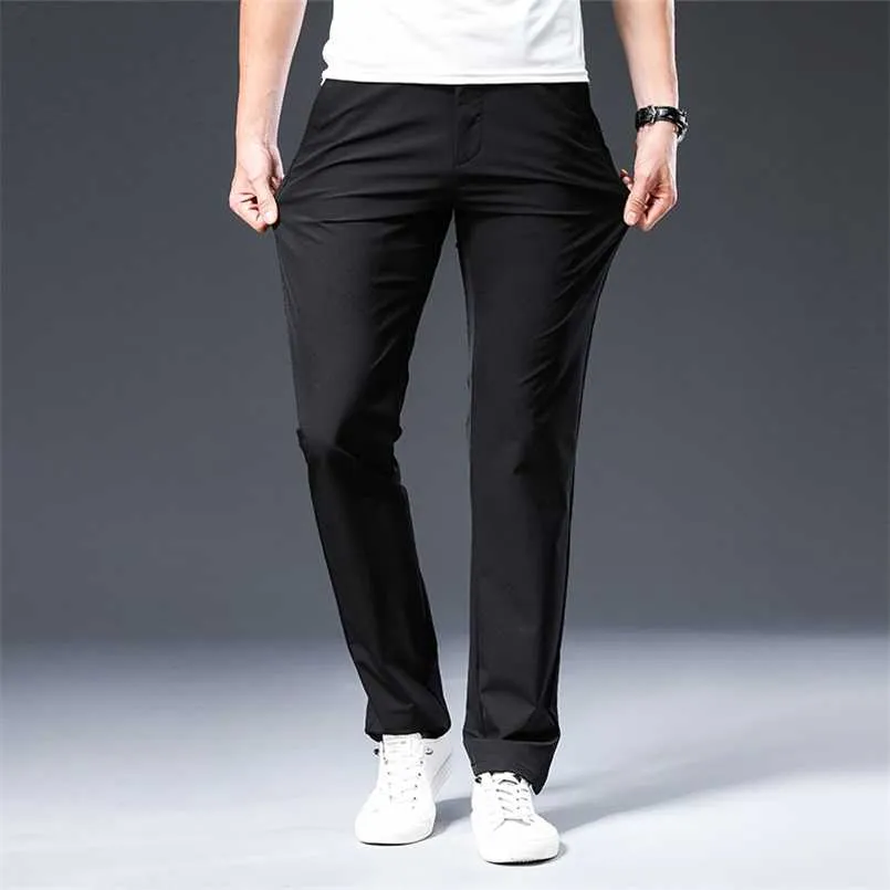 BROWON Llegada Pantalón de hombre Primavera Verano Transpirable Color sólido Medio Recto Suelto Hombres Pantalones Tallas grandes 42 211112