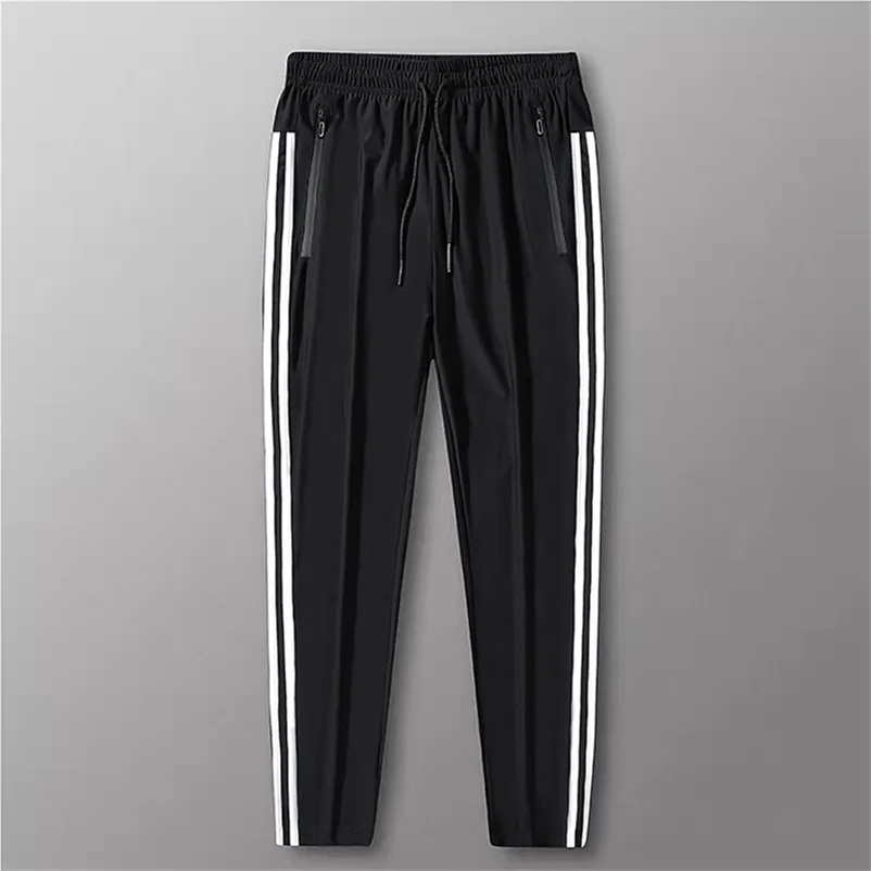 Casual Pant Men's Joggers Sports Small Feet Trousers Hip-Hop Men Pants Three Bar Black Jogging Pants Men All-match 6xl 211108