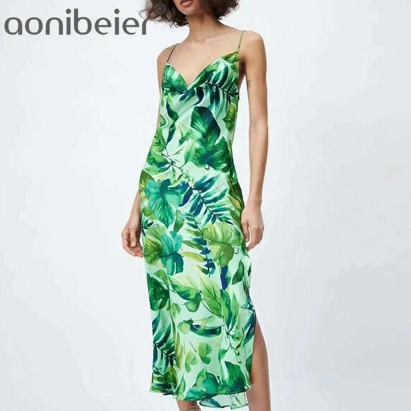 Leaf printed spaghetti deals strap maxi dress