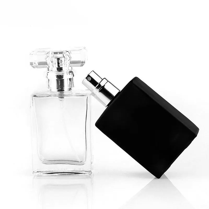 Rechteckige kosmetische mattschwarze, klare, flache, quadratische Glas-50-ml-Parfüm-Pumpsprühflaschen für die Hautpflege