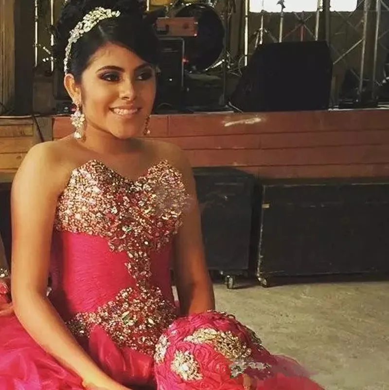 Vestidos de 15 top años fucsia con dorado