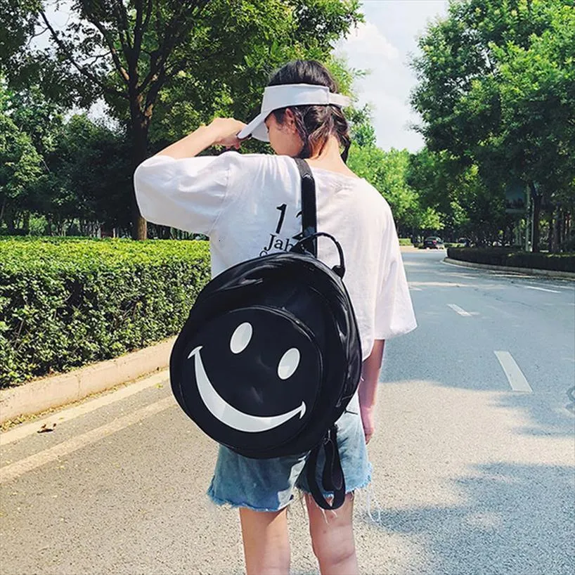 Smiley face backpack 90s deals