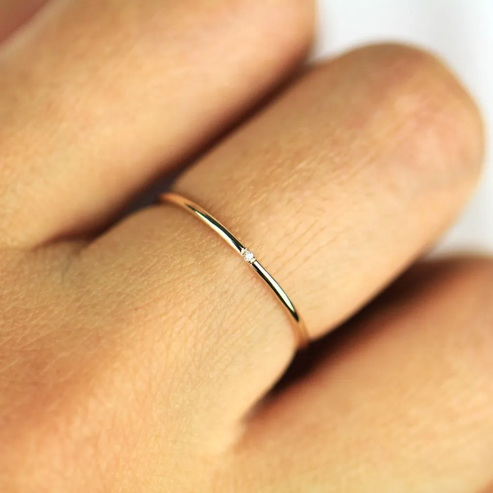 Thin band small diamond ring on sale