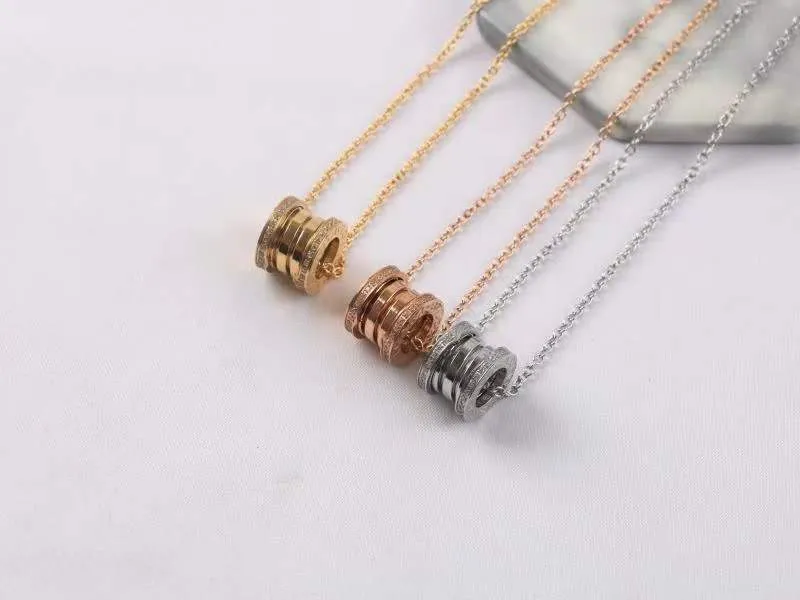Fashion Spring Necklace Dimensional Hollow Necklaces Retro Sterling Silver/Gold for Men and Women Small Pendants Necklace with Gift Box