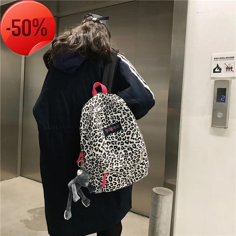 Sac à dos de luxe Version coréenne Ins Harajuku Leopard Schoolbag Junior High School Students Polyvalent