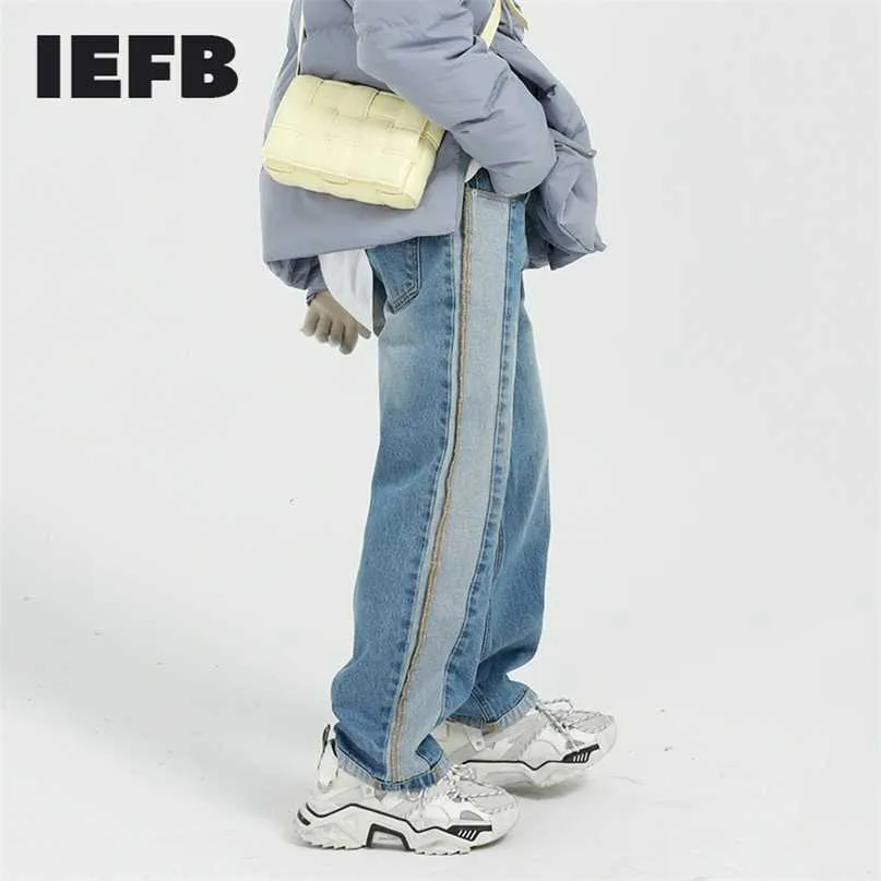 IEFB Mäns Slitage Färg Block Patchwork Blå Jeans Höst Koreanska Streetwear Design Tvättade Denim Straight Loose Byxor 211108