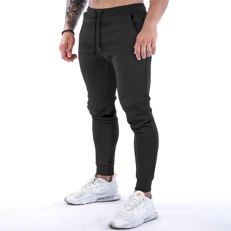 Hombres pantalones casuales joggers pantalones de algodón gimnasio entrenamiento pista transpirable músculo fitness corriendo slim fit cónico pantalón 211112