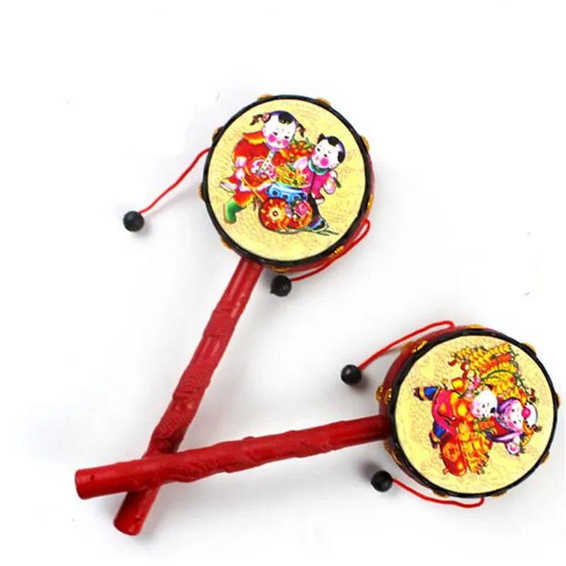 Vente en gros - 1 Pcs Chinois Traditionnel Hochet Tambour Spin Jouets Pour Bébé Enfants Bande Dessinée Main Cloche Jouet En Bois Hochet Tambour Musical