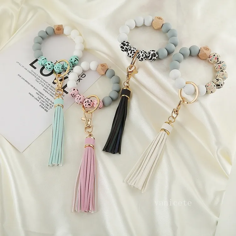 Party Favor Silicone Bead bracelet key ring anti loss wood women Tassel key chain 9 style T2I52862