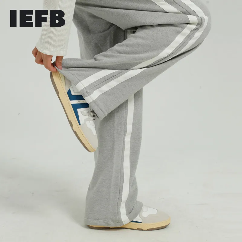IEFB мужская носить весна корейская уличная одежда мода боковая полосатая пэчворк свободные повседневные брюки эластичные талии прямые брюки 210524