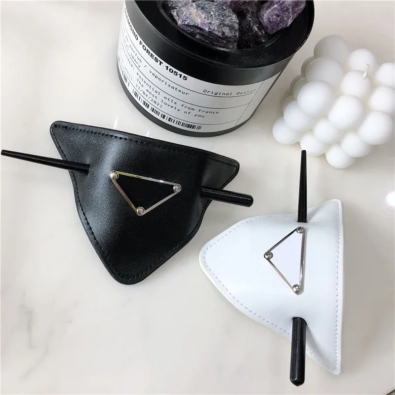 The new p family hairpin retro leather online celebrity inverted triangle alloy iron chopsticks hairpin INS European and American wind letter LOGO.