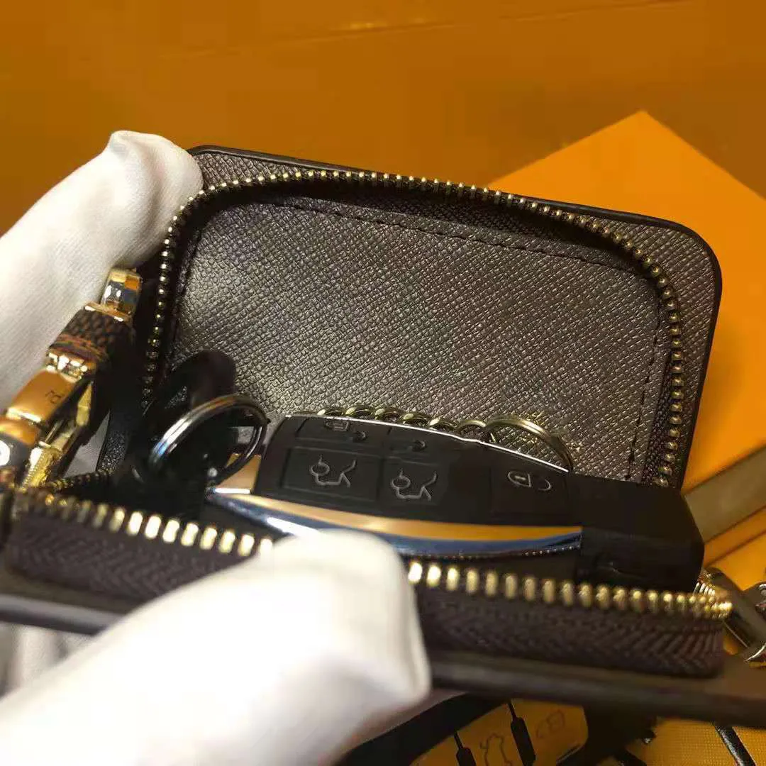 Luxurys designers mode nyckel plånböcker spännväska bil nyckelring handgjorda läder hög kvalitet nyckelringar man kvinna monogram handväska ba268h